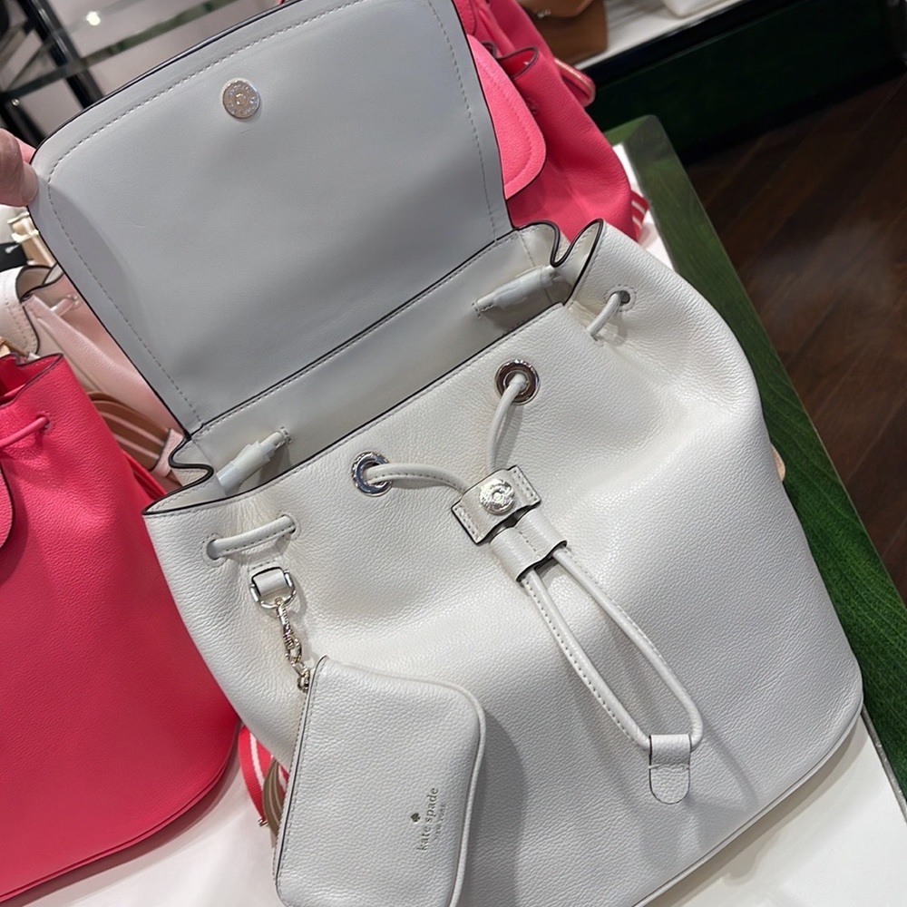 Kate Spade Rosie Medium Flap Backpack 
K8714 pebbled leather Parchment rosie
NWT - Picture 11 of 16
